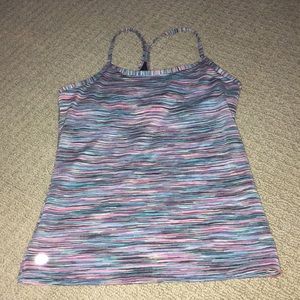 A tight tank top with a razor back multi colored!